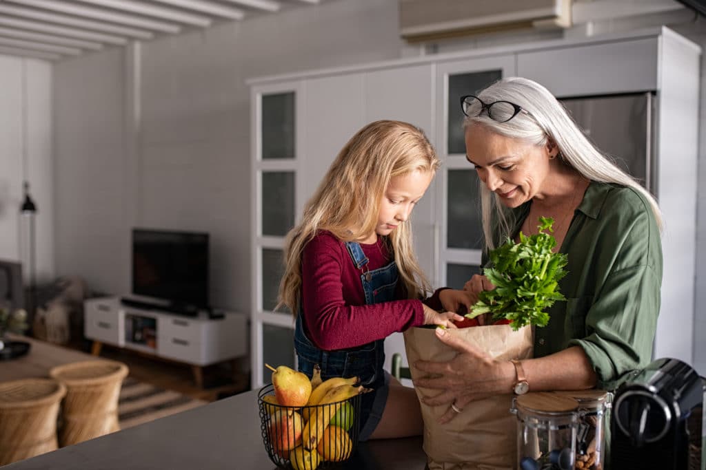 Grandmother and daughter grocery shopping