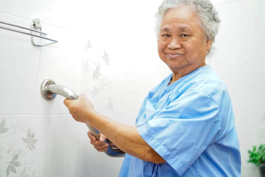 Woman Using Grab Bar