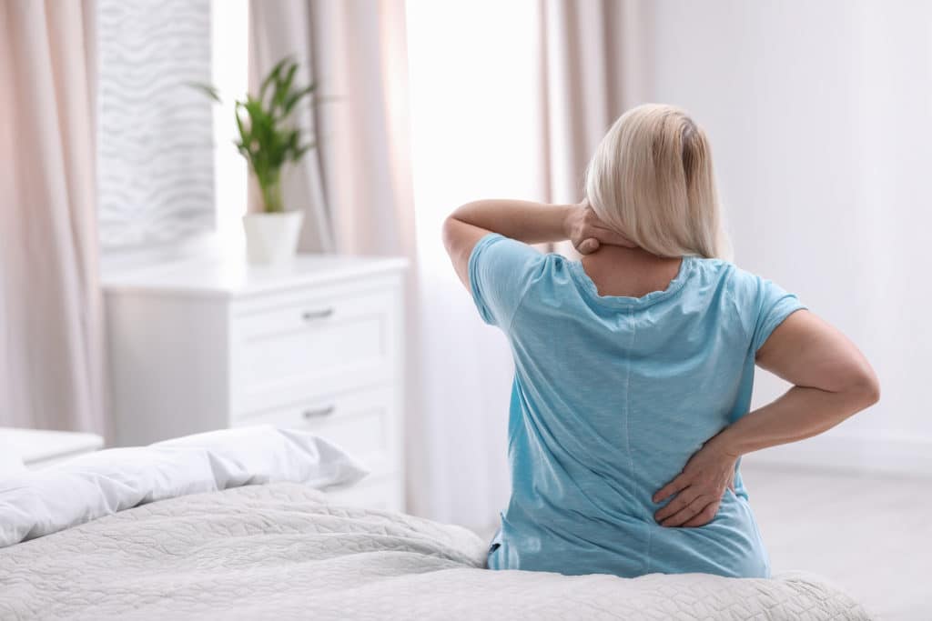 Woman With Osteoarthritis of the Spine | Medicare Plan Finder